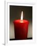 A Scented Votive Candle Burns-null-Framed Photographic Print