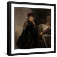 A Scholar Seated at a Desk (Scholar at His Stud)-Rembrandt van Rijn-Framed Premium Giclee Print