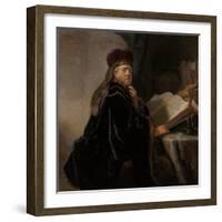 A Scholar Seated at a Desk (Scholar at His Stud)-Rembrandt van Rijn-Framed Giclee Print