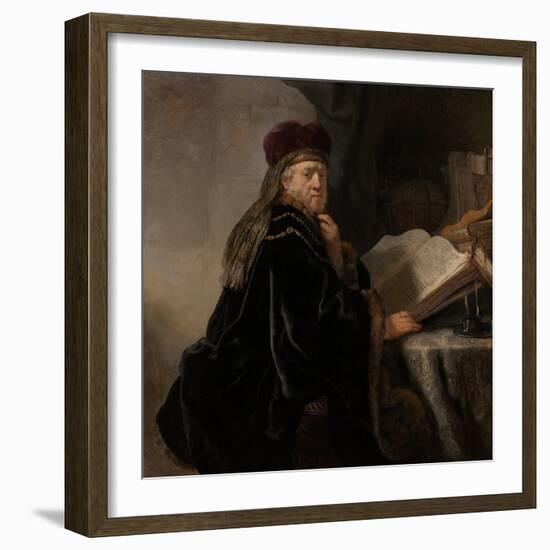 A Scholar Seated at a Desk (Scholar at His Stud)-Rembrandt van Rijn-Framed Giclee Print