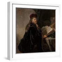 A Scholar Seated at a Desk (Scholar at His Stud)-Rembrandt van Rijn-Framed Giclee Print