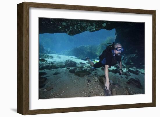 A Scuba Diver Explores the Blue Springs Cave in Marianna, Florida-null-Framed Art Print