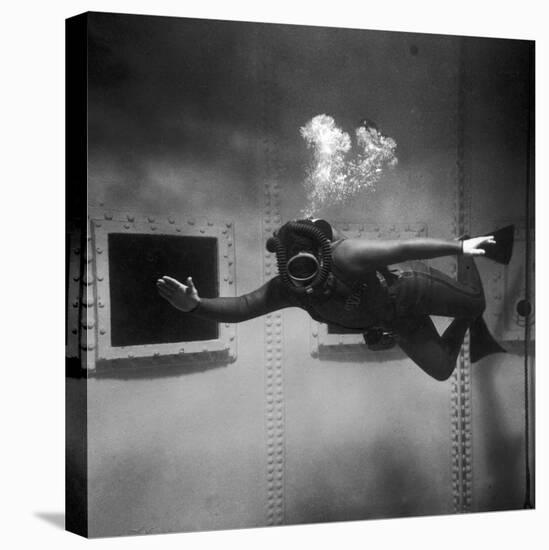 A Scuba Diver Inside a Large Metal Water Tank. Photograph by Heinz Zinram-Heinz Zinram-Stretched Canvas
