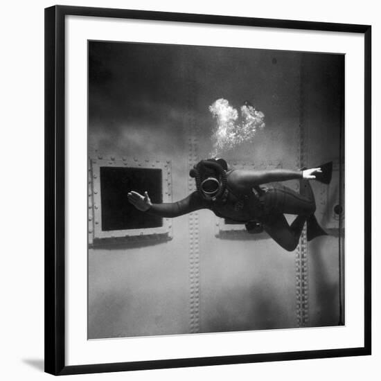 A Scuba Diver Inside a Large Metal Water Tank. Photograph by Heinz Zinram-Heinz Zinram-Framed Photographic Print