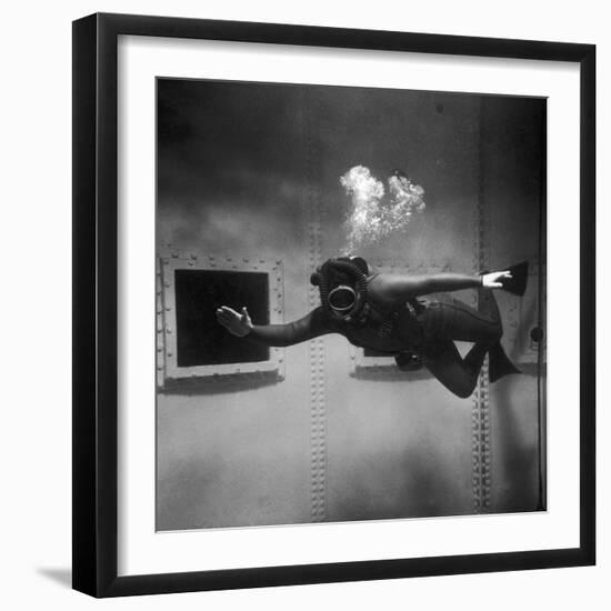 A Scuba Diver Inside a Large Metal Water Tank. Photograph by Heinz Zinram-Heinz Zinram-Framed Photographic Print