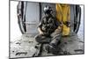 A Search and Rescue Swimmer Sits in the Back of an Mh-60S Sea Hawk-null-Mounted Photographic Print