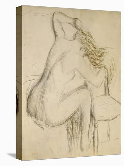 A Seated Woman Styling Her Hair-Edgar Degas-Stretched Canvas