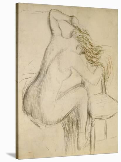 A Seated Woman Styling Her Hair-Edgar Degas-Stretched Canvas