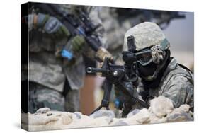 A Security Forces Airman Provides Cover for His Squad-null-Stretched Canvas