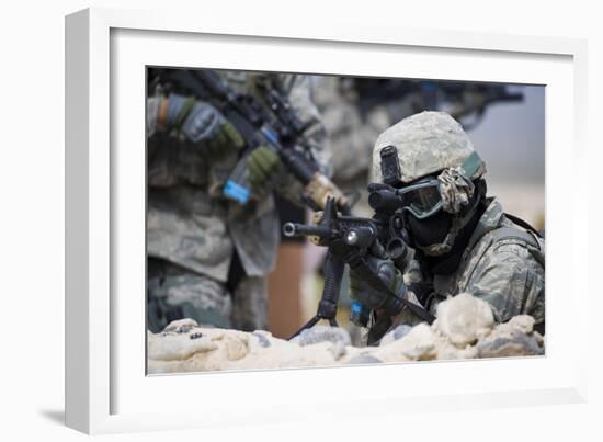 A Security Forces Airman Provides Cover for His Squad-null-Framed Photographic Print