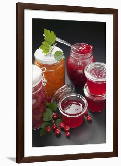 A Selection of Jams and Jelly in Jars, Redcurrants and Leaves-Foodcollection-Framed Photographic Print