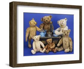 A Selection of Teddy Bears around a Black Painted Tinplate Toy Stove-null-Framed Giclee Print