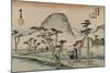 A Servant Rushes over a Winding Road with Trees and a Gray Mountain Behind to See Mount Fuji-Utagawa Hiroshige-Mounted Art Print