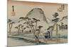 A Servant Rushes over a Winding Road with Trees and a Gray Mountain Behind to See Mount Fuji-Utagawa Hiroshige-Mounted Art Print