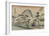 A Servant Rushes over a Winding Road with Trees and a Gray Mountain Behind to See Mount Fuji-Utagawa Hiroshige-Framed Art Print