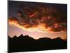 A Setting Sun Casts a Colorful Light on the Teton Mountains Near Jackson Hole-null-Mounted Premium Photographic Print