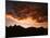 A Setting Sun Casts a Colorful Light on the Teton Mountains Near Jackson Hole-null-Mounted Photographic Print
