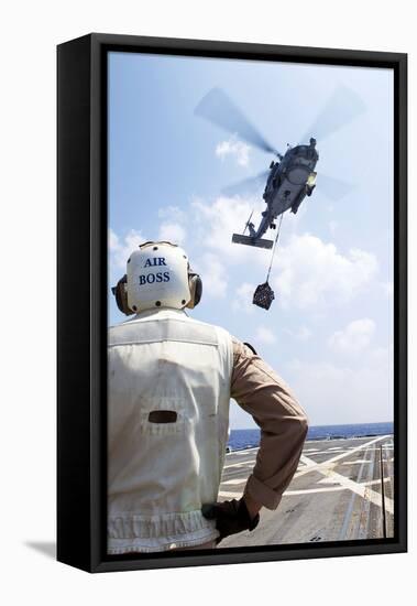 A Sh-60 R Seahawk Prepares to Drop Supplies-null-Framed Stretched Canvas