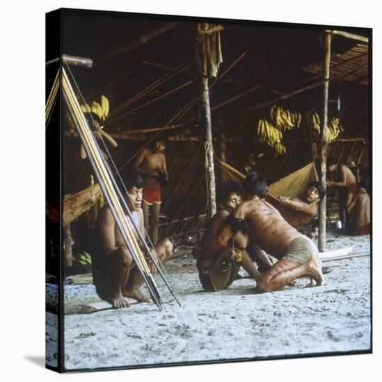 A Shaman Attempts to Heal a Sick Man by Driving Out Evil Spirits, at Mavaca, Venezuela-null-Stretched Canvas