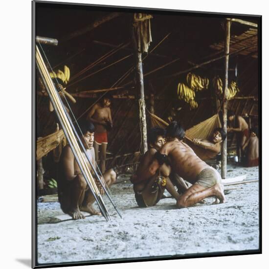 A Shaman Attempts to Heal a Sick Man by Driving Out Evil Spirits, at Mavaca, Venezuela-null-Mounted Photographic Print