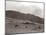 A Shepherd with His Border Collie Sheep Dogs Checks His Flock Somewhere on the Cumbrian Hills, 1935-null-Mounted Photographic Print