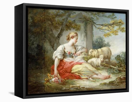 A Shepherdess Seated with Sheep and a Basket of Flowers Near a Ruin in a Wooded Landscape-Jean-Honoré Fragonard-Framed Stretched Canvas