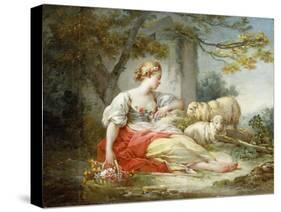 A Shepherdess Seated with Sheep and a Basket of Flowers Near a Ruin in a Wooded Landscape-Jean-Honoré Fragonard-Stretched Canvas