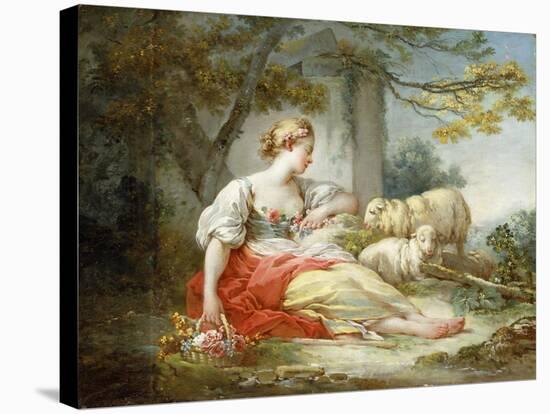 A Shepherdess Seated with Sheep and a Basket of Flowers Near a Ruin in a Wooded Landscape-Jean-Honoré Fragonard-Stretched Canvas