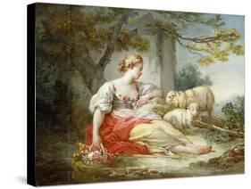 A Shepherdess Seated with Sheep and a Basket of Flowers Near a Ruin in a Wooded Landscape-Jean-Honoré Fragonard-Stretched Canvas