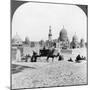 A 'Ship of the Desert' Passing Tombs of By-Gone Moslem Rulers, Cairo, Egypt, 1905-Underwood & Underwood-Mounted Photographic Print
