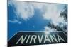 A sign that reads "Nirvana"-null-Mounted Photographic Print