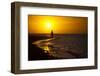 A Silhouette of a Woman Walking in the Waves of the Surf at Sunset in Holbox Island, Mexico-Karine Aigner-Framed Photographic Print