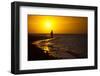 A Silhouette of a Woman Walking in the Waves of the Surf at Sunset in Holbox Island, Mexico-Karine Aigner-Framed Photographic Print