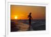 A Silhouette of a Woman Wearing a Hat Walking in the Surf at Sunset on Holbox Island, Mexico-Karine Aigner-Framed Photographic Print