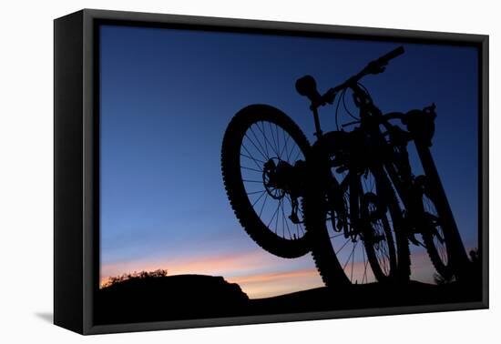 A Silhouette of Two Mountain Bikes on Car Rack in Red Rock Canyon in Nevada-Brett Holman-Framed Stretched Canvas