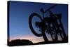 A Silhouette of Two Mountain Bikes on Car Rack in Red Rock Canyon in Nevada-Brett Holman-Stretched Canvas
