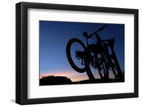 A Silhouette of Two Mountain Bikes on Car Rack in Red Rock Canyon in Nevada-Brett Holman-Framed Photographic Print