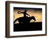 A Silhouetted Cowboy Riding Alone a Ridge at Sunset in Shell, Wyoming, USA-Joe Restuccia III-Framed Photographic Print