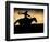 A Silhouetted Cowboy Riding Alone a Ridge at Sunset in Shell, Wyoming, USA-Joe Restuccia III-Framed Photographic Print