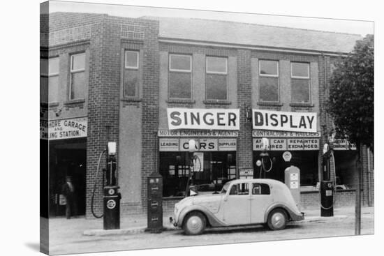 A Singer 11Hp Airstream Saloon Car Outside a Welsh Garage, Wales, 1935-null-Stretched Canvas