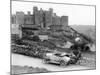 A Singer Car in Front of Harlech Castle, Wales, Early 1920S-null-Mounted Photographic Print