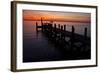 A Single Sailboat Sits on the Water of the Bay Alongside an Empty Dock on Tilghman Island, Maryland-Karine Aigner-Framed Photographic Print