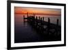 A Single Sailboat Sits on the Water of the Bay Alongside an Empty Dock on Tilghman Island, Maryland-Karine Aigner-Framed Photographic Print