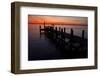 A Single Sailboat Sits on the Water of the Bay Alongside an Empty Dock on Tilghman Island, Maryland-Karine Aigner-Framed Photographic Print