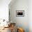 A Single Sailboat Sits on the Water of the Bay Alongside an Empty Dock on Tilghman Island, Maryland-Karine Aigner-Framed Photographic Print displayed on a wall