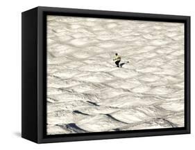 A Skier Makes His Way Down a Sea of Moguls at Sugarbush Ski Area-null-Framed Stretched Canvas