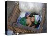 A Small Child Sleeps in a Cart on the Streets of Phnom Penh, Cambodia, Indochina-Andrew Mcconnell-Stretched Canvas