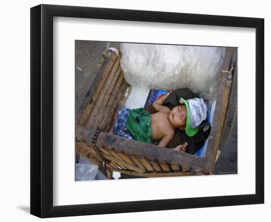 A Small Child Sleeps in a Cart on the Streets of Phnom Penh, Cambodia, Indochina-Andrew Mcconnell-Framed Photographic Print