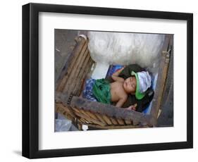 A Small Child Sleeps in a Cart on the Streets of Phnom Penh, Cambodia, Indochina-Andrew Mcconnell-Framed Photographic Print