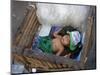 A Small Child Sleeps in a Cart on the Streets of Phnom Penh, Cambodia, Indochina-Andrew Mcconnell-Mounted Photographic Print